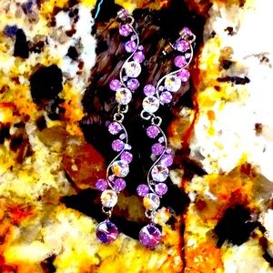 - - - Earrings with regular rhinestones and pale lavender colored rhinesto…